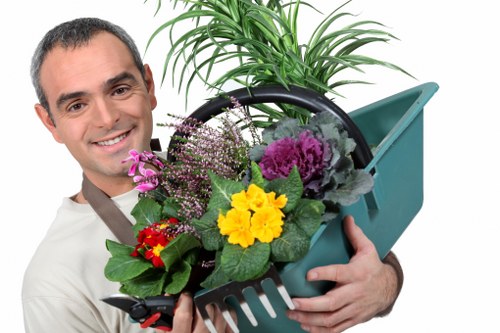 Professional landscapers completing safe outdoor work in Hammersmith